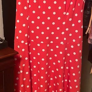 Red sleeveless dress with white dots.